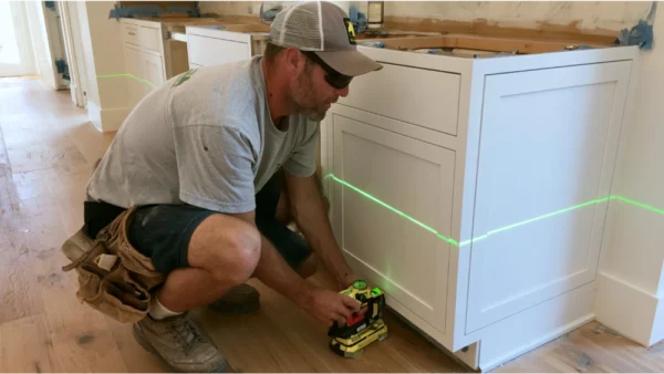 How Do Installers Level Cabinets On Uneven Floors